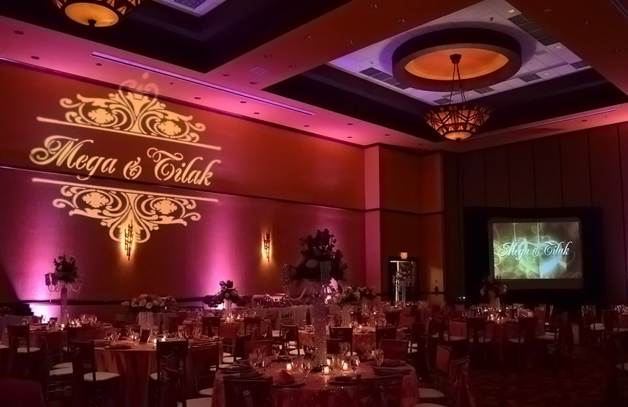 reception hall with couple's names projected on wall by iRock Your Party