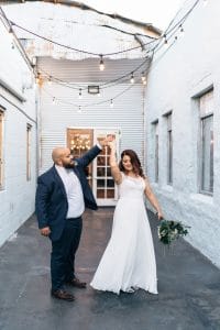 1010-West-Couple dancing in alley way between buildings