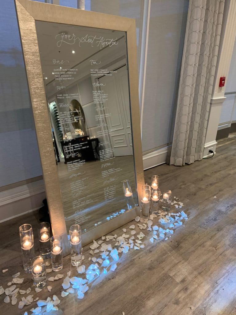 Full length mirror with flowers and candles