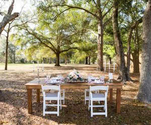 C-Squared-Events-LLC-Wooden table outdoors surrounded by trees