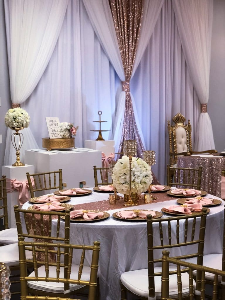 Destiny Event Venue - reception hall in gold and pink with elegant fabric draping