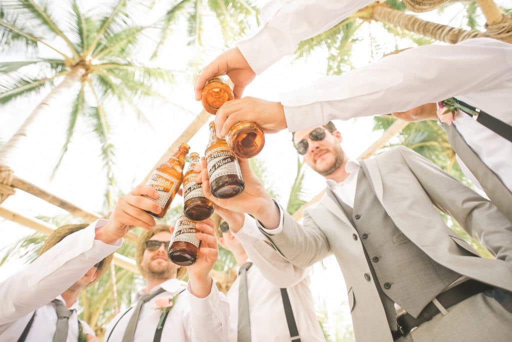 groomsmen toasting to celebrate marriage