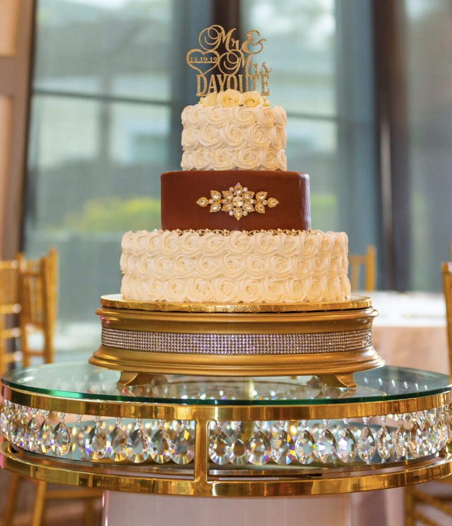 wedding cake with luxurious decorations with gold accents
