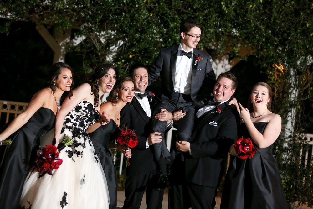 Live-Happy-Studio-Bridal party lifting Groom up in celebration