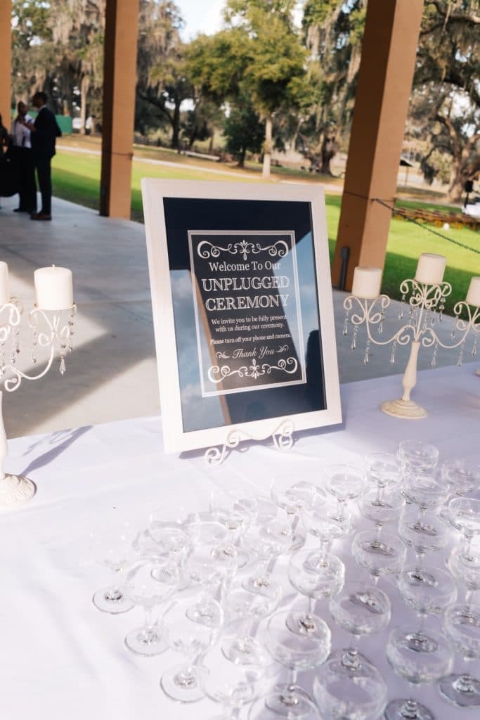 Orlando-Party-Servers-Unplugged Wedding sign with table decoration