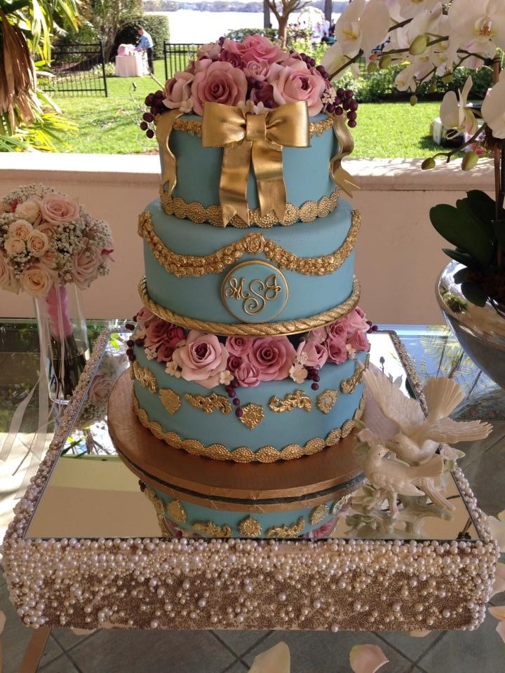Weddings Inc - Intricately decorated three tier wedding cake