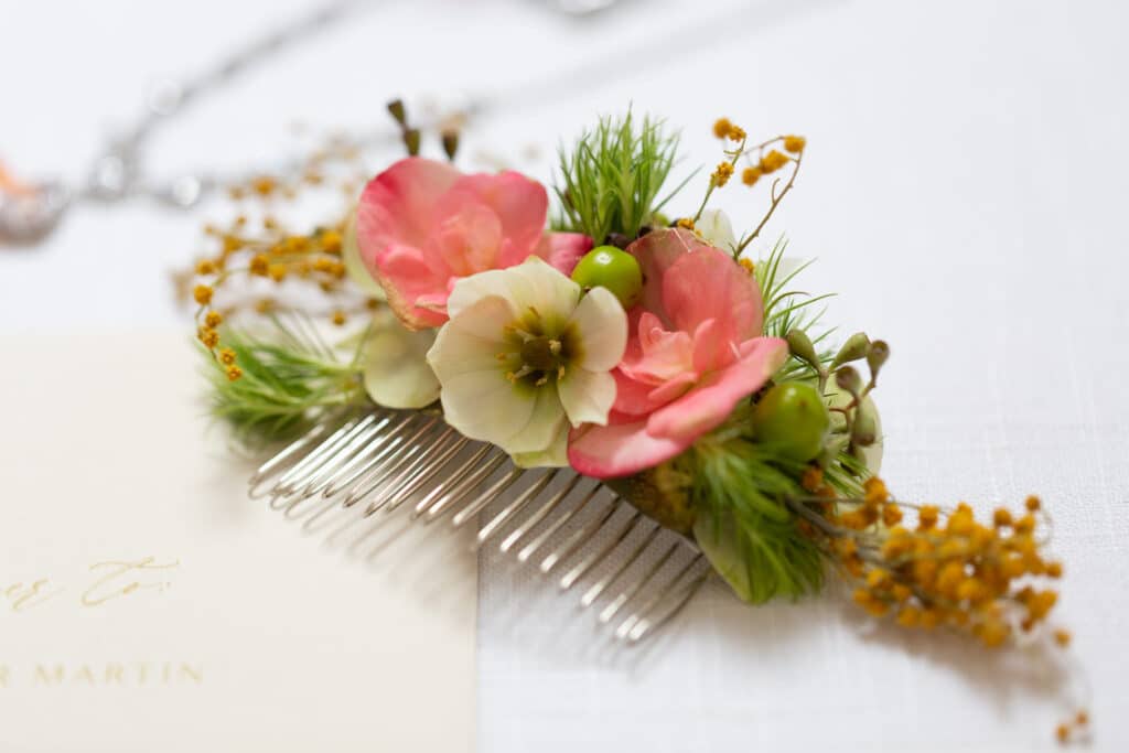 small flower arrangement that can go in a woman's hair, provided by The Flower Studio