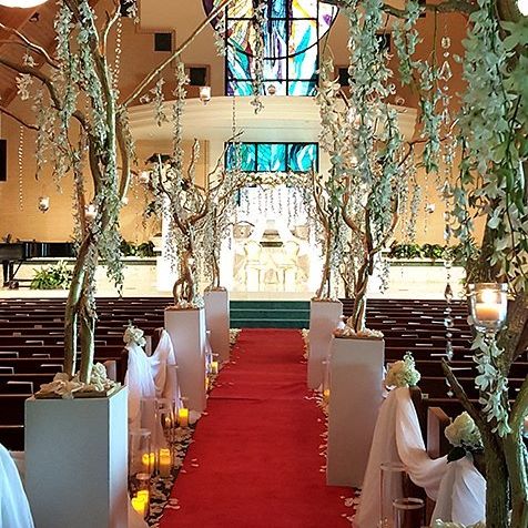 church decorated with flowers for wedding reception