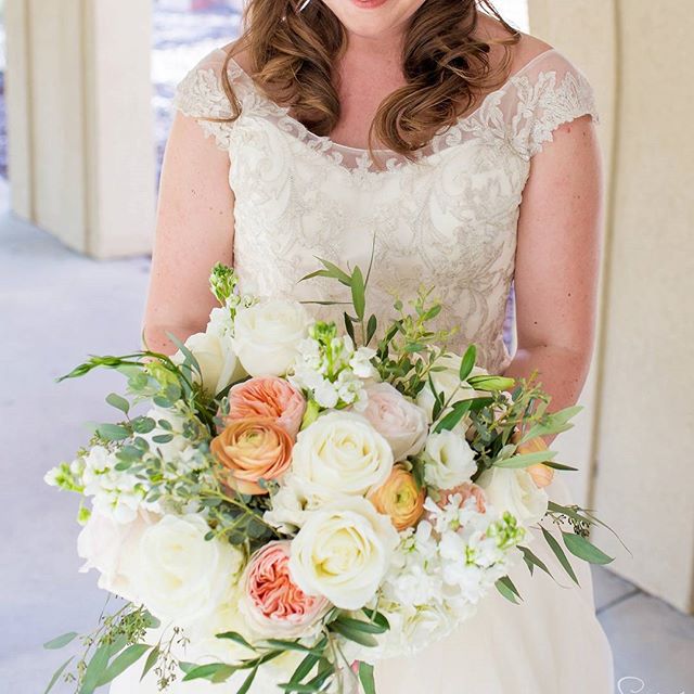 bride holding her flower bouquet