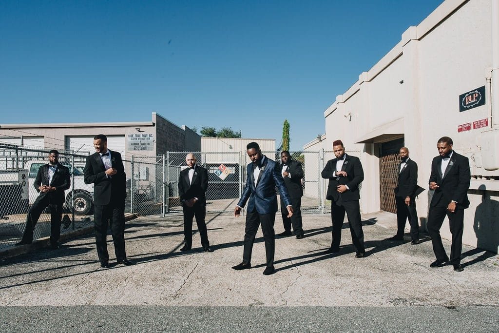 Live-Love-Laugh-Events-Groomsmen posing with Groom outside