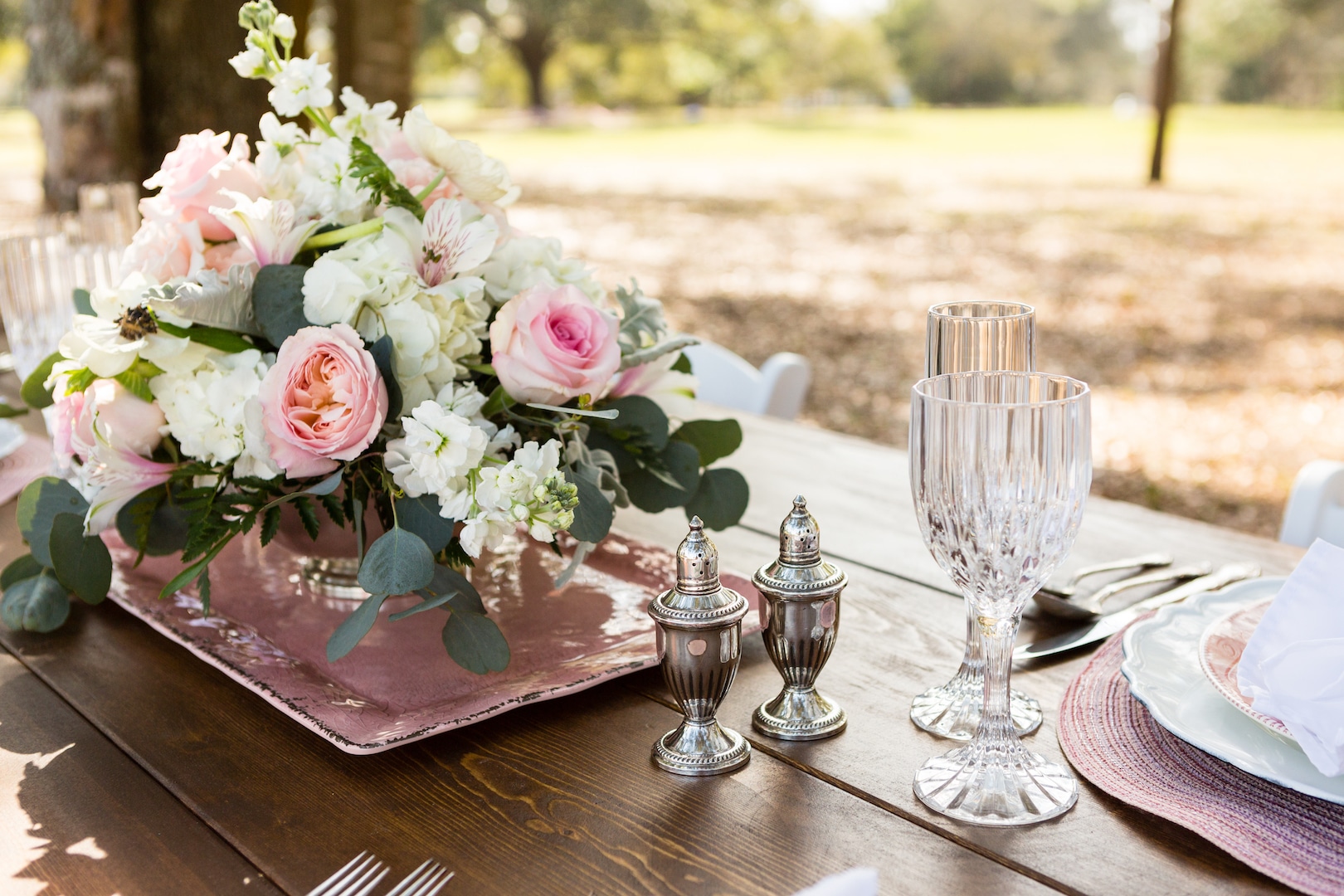 C Squared Events - outdoor wedding reception table with pink floral centerpiece