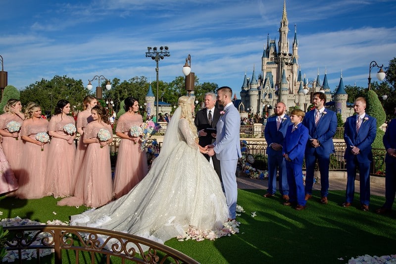 A Beautiful Ceremony - Kevin Knox officiating wedding in front of Cinderella's castle at Walt Disney World