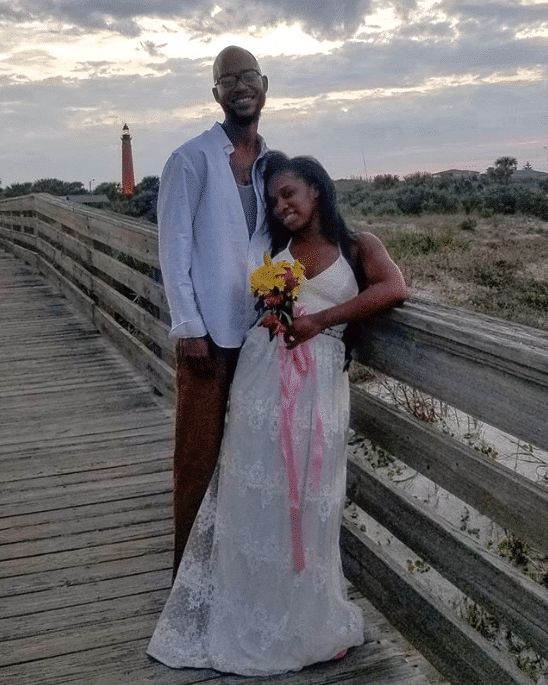 Ceremonies By Catherine - happy newlyweds on beach pier 