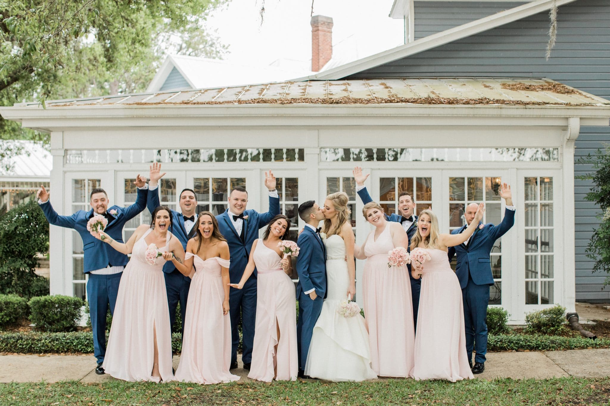 Highland Manor - Wedding party in front of historic building