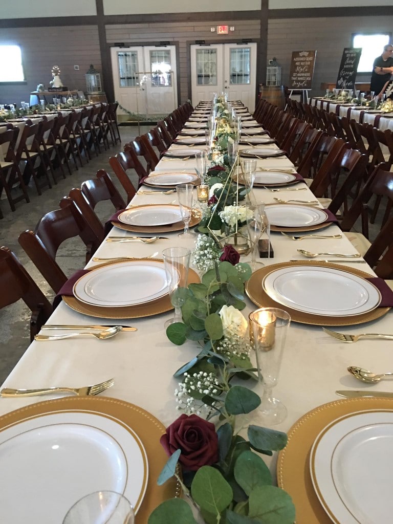 Perfect-Day-Productions-Long table setting with small greenery centerpieces