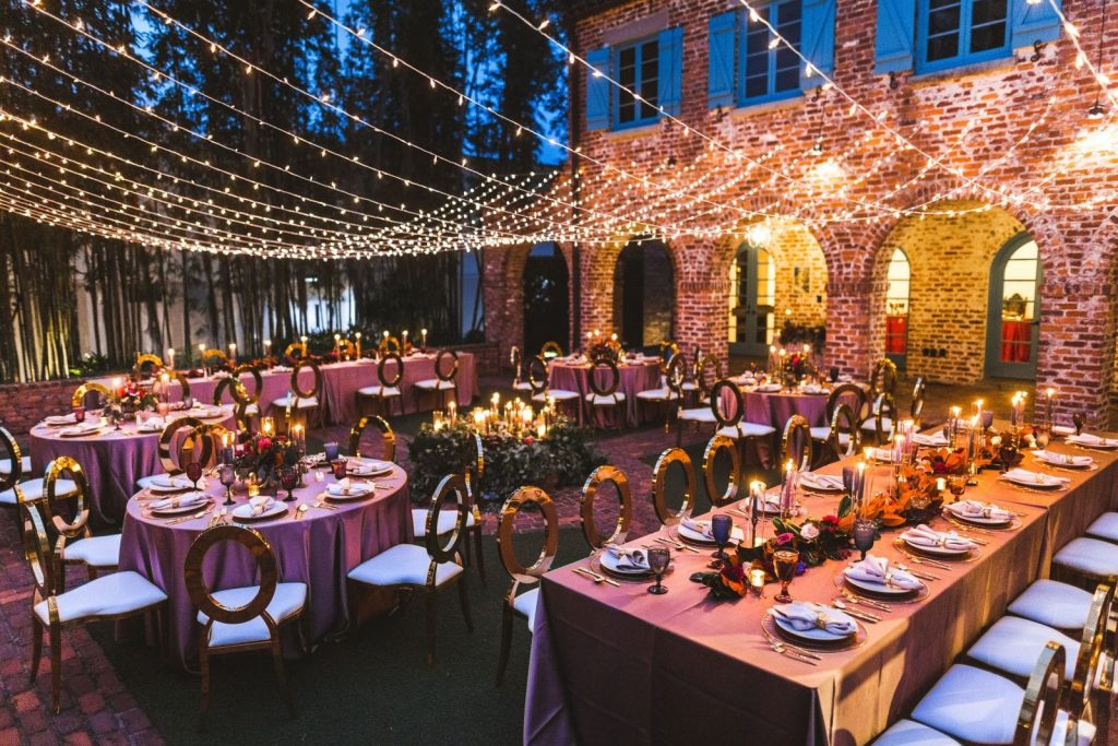 Outdoor seating area with market lights by Runway Events