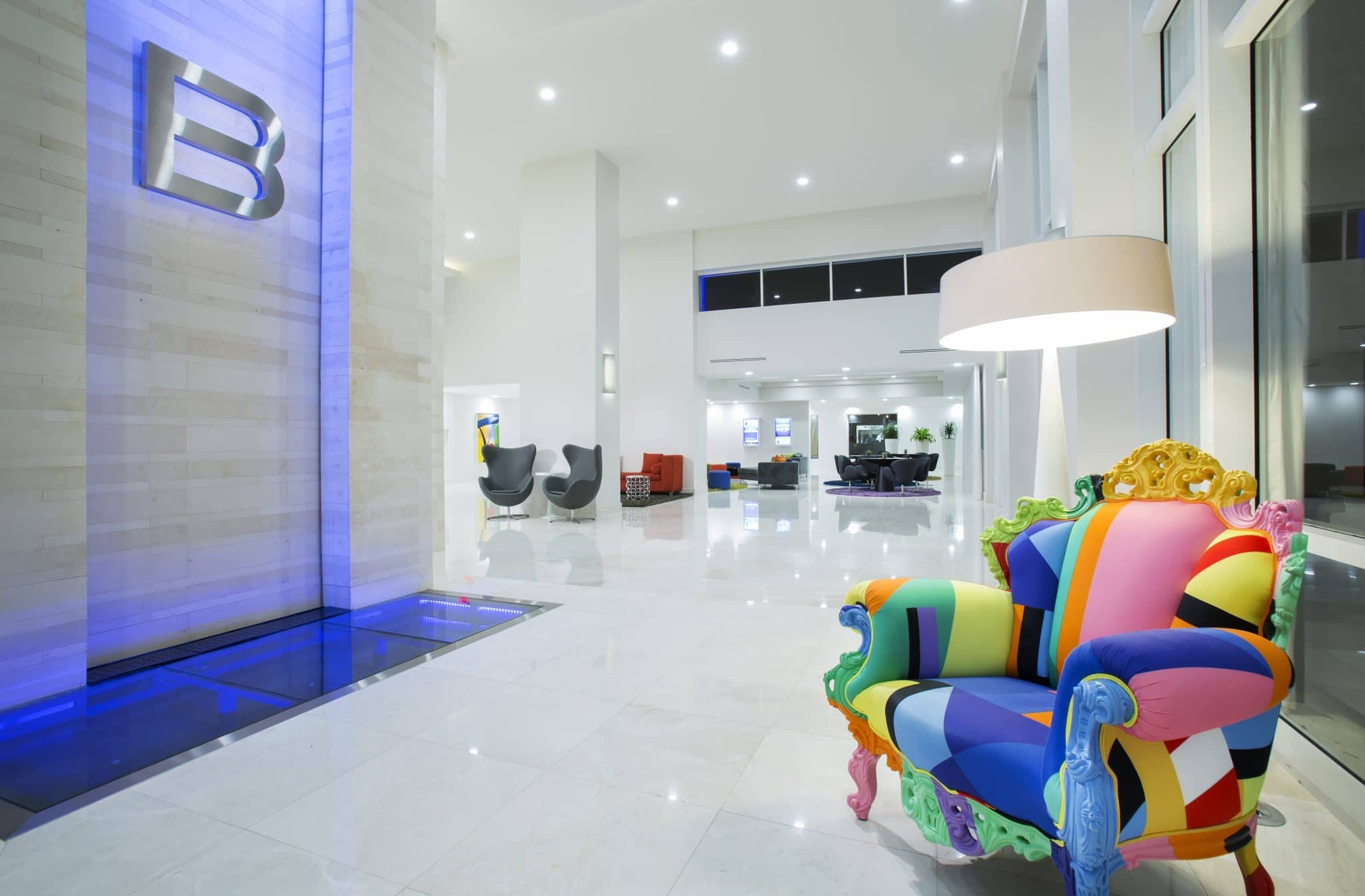 B resort & spa lobby mostly white with multi-colored seating