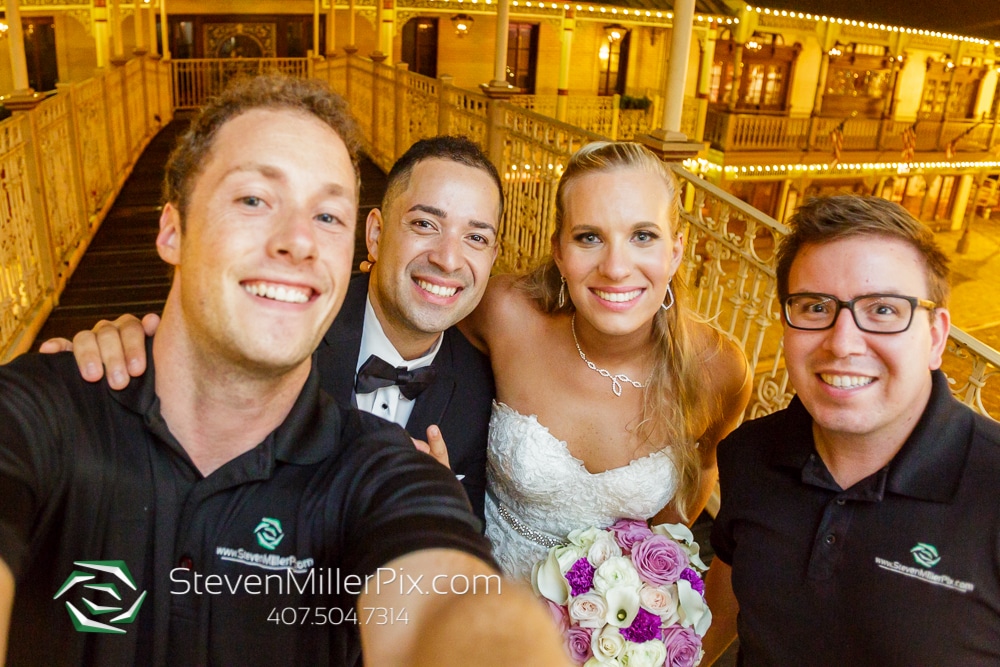 Steven Miller Photography - bride & groom at venue taking selfie with photographers
