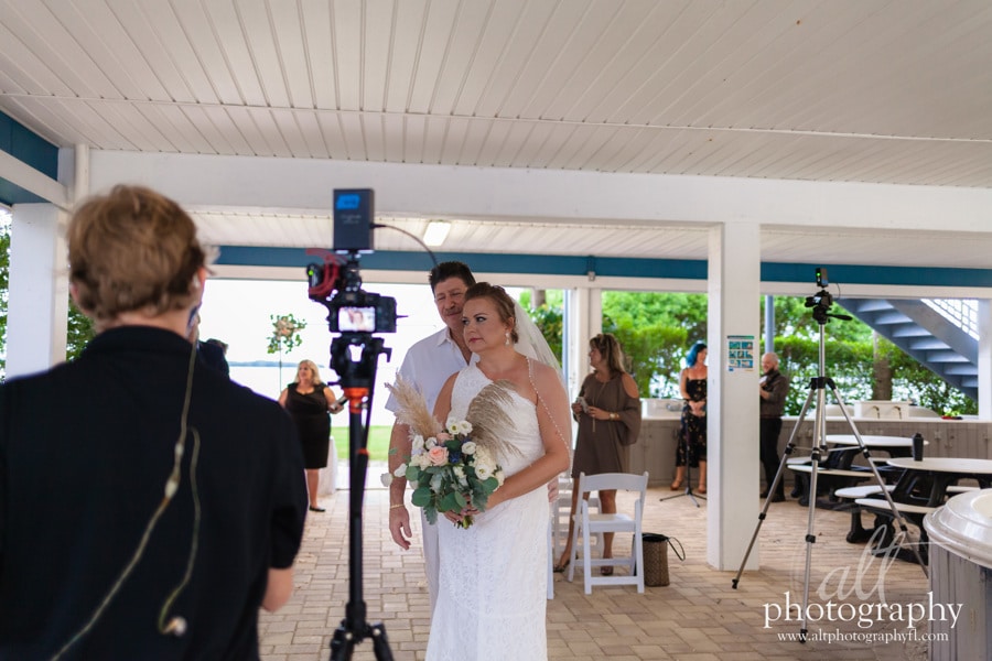 bride and groom after outdoor wedding filming by Live Hub Events