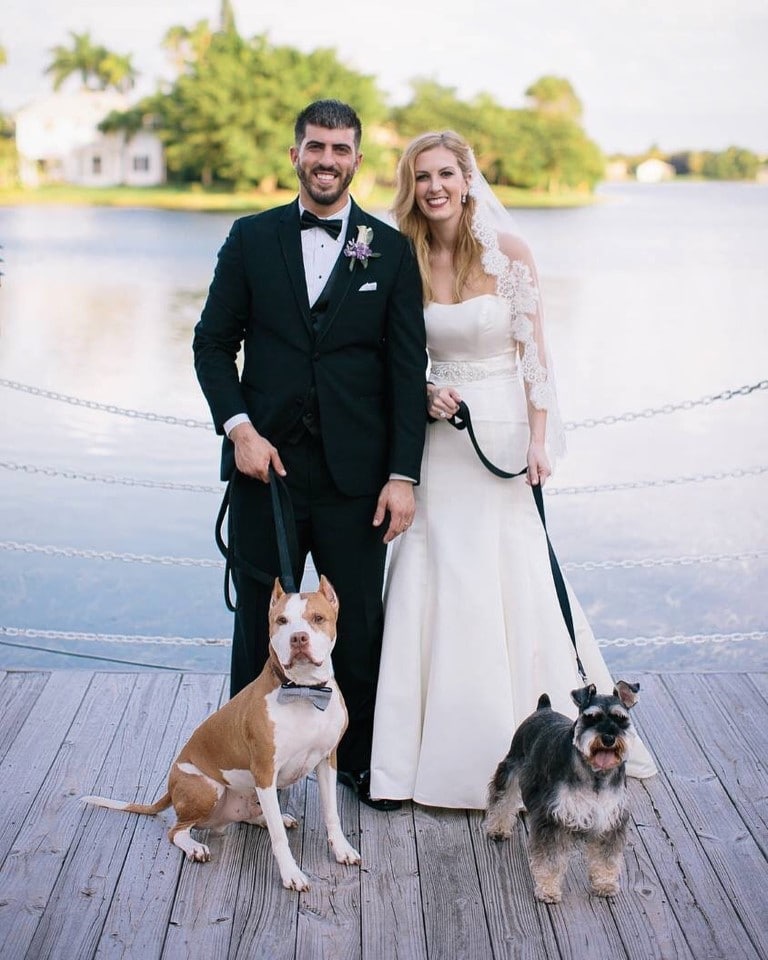 Furry-Ventures-Pet-Care-bride and groom with dogs on dock