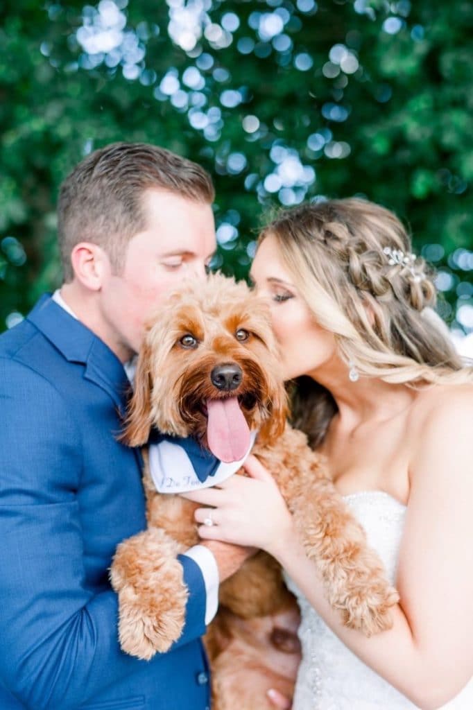 Furry-Ventures-Pet-Care-Bride and Groom kissing dog