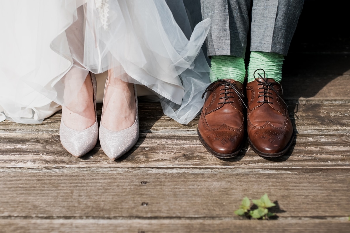 wedding experience gifts - bride and groom feet in wedding shoes