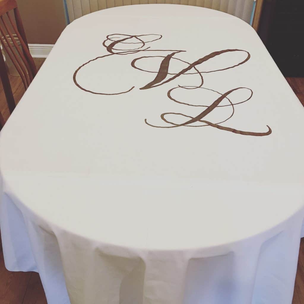 custom wedding aisle runners- white tablecloth with monogram 