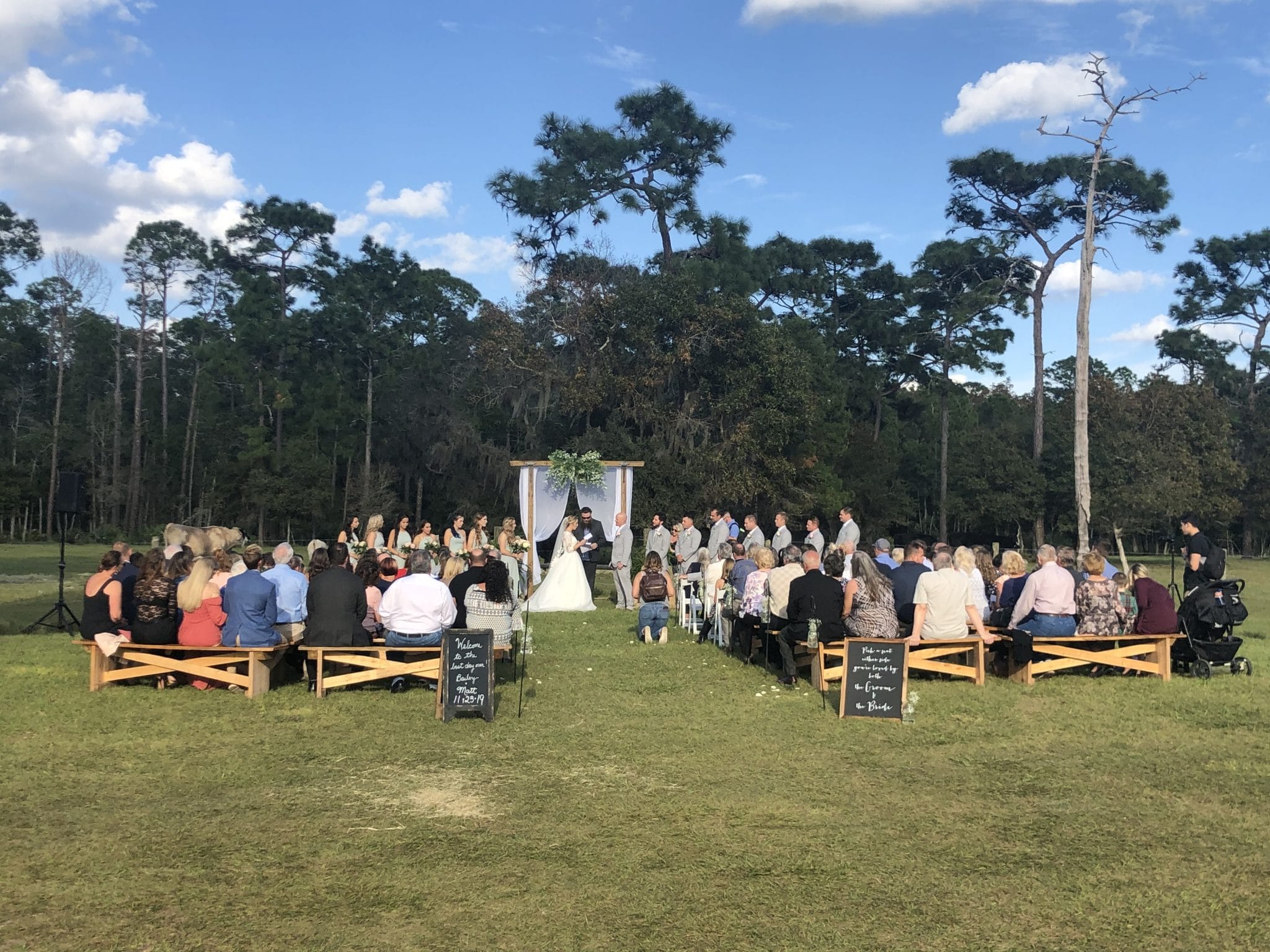 Diamond L Venue - wedding ceremony with guest on benches outside