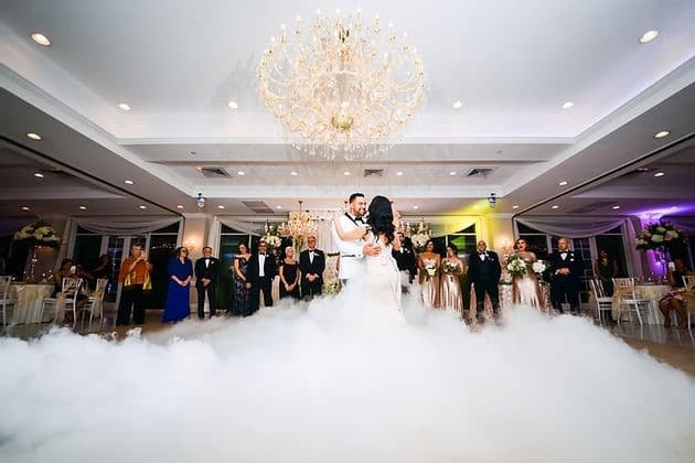 bride and groom dancing on a cloud with Xclusive Deejays