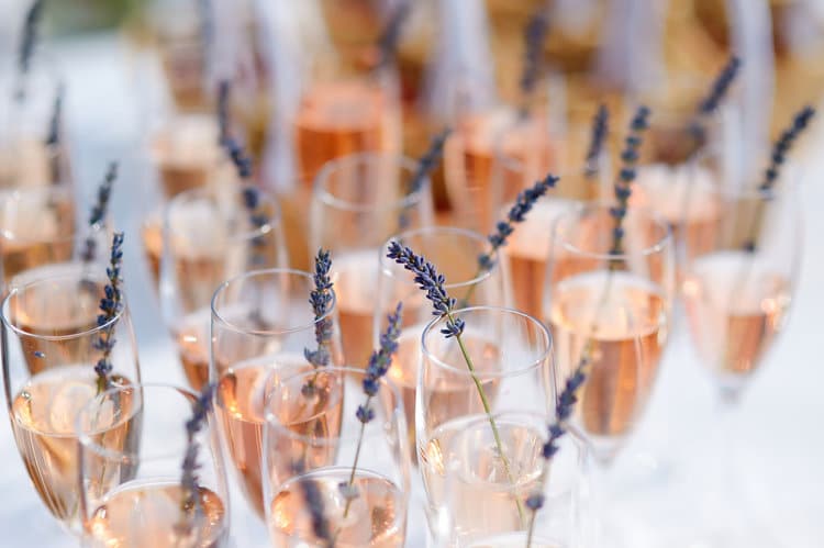 blush champagne with sprig adornment by Foodie Catering