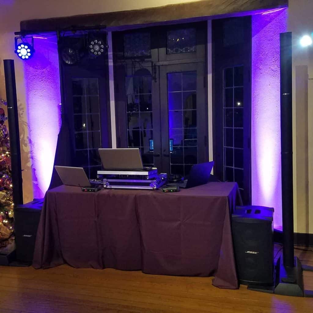 Atomic Entertainment - DJ equipment with purple lights