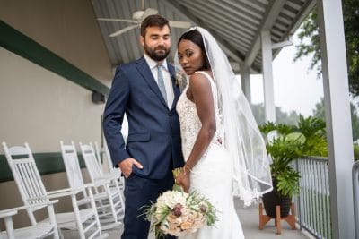 Barney E. Veal Center bride and groom standing outside after ceremony