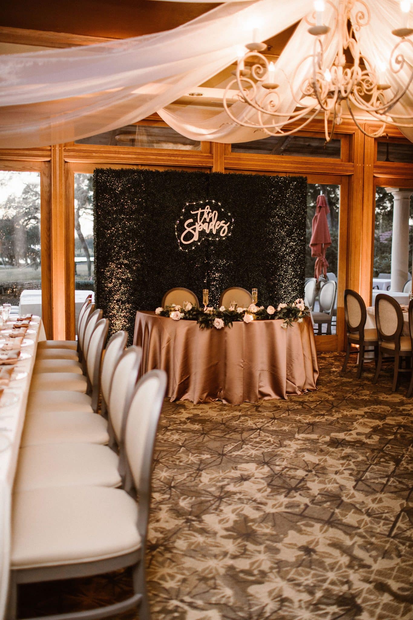 Head table at a wedding reception at a Florida Spanish style wedding venue