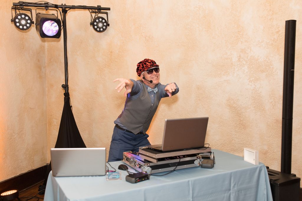 wedding dj in red hat and sunglasses
