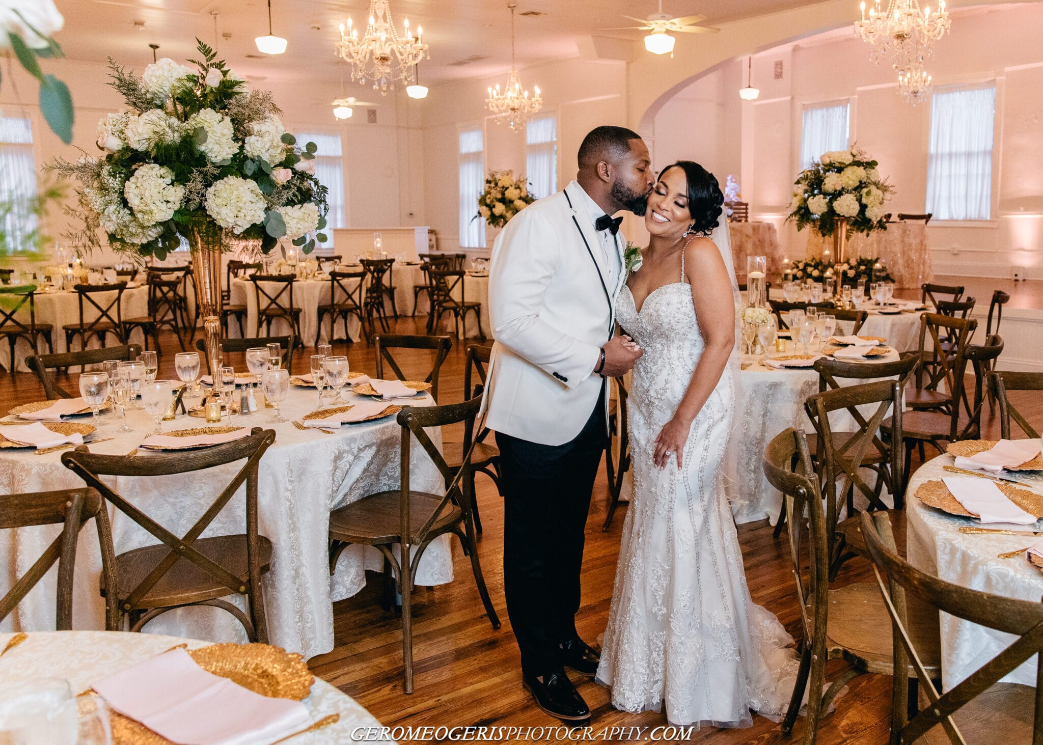 Venue 1902 at Preservation Hall, bride and groom in center of dining room