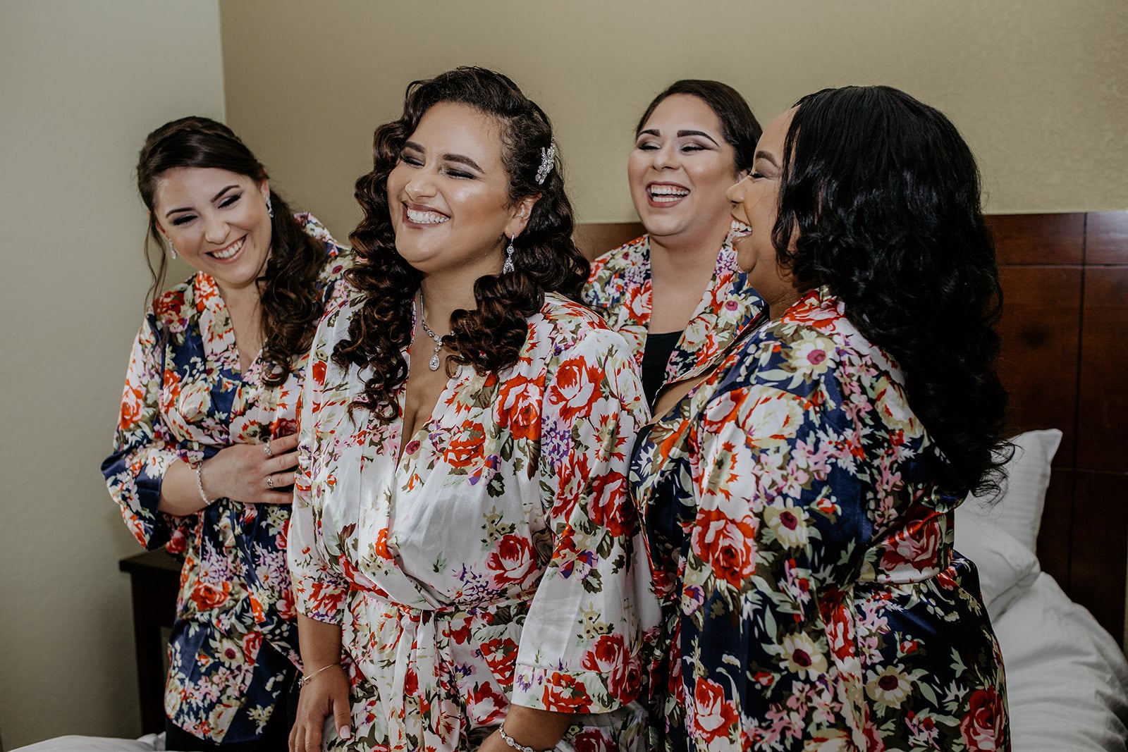 Gabriella Anthoney's Design Artistry bride and bridesmaids in robes getting ready for big day
