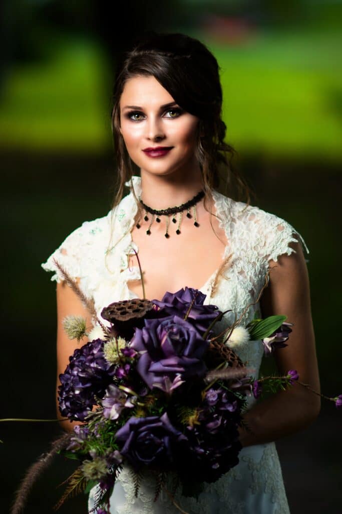 Gothic Victorian Wedding, bride with dark purple flower bouquet