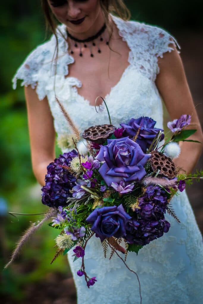 Gothic Victorian Wedding bride with purple bouquet