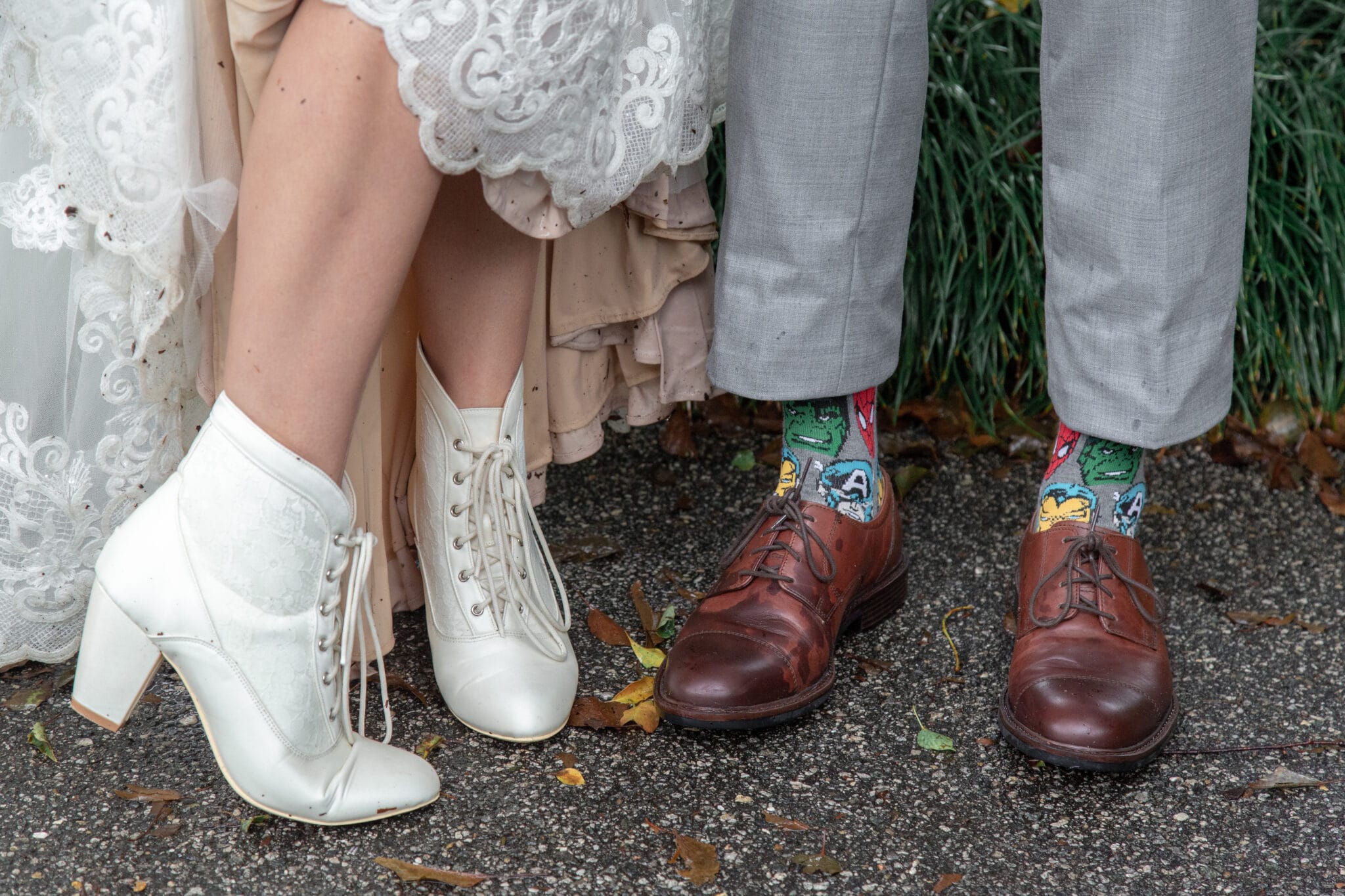 bride and groom unique wedding day shoes with fun men's socks and old fashioned boots
