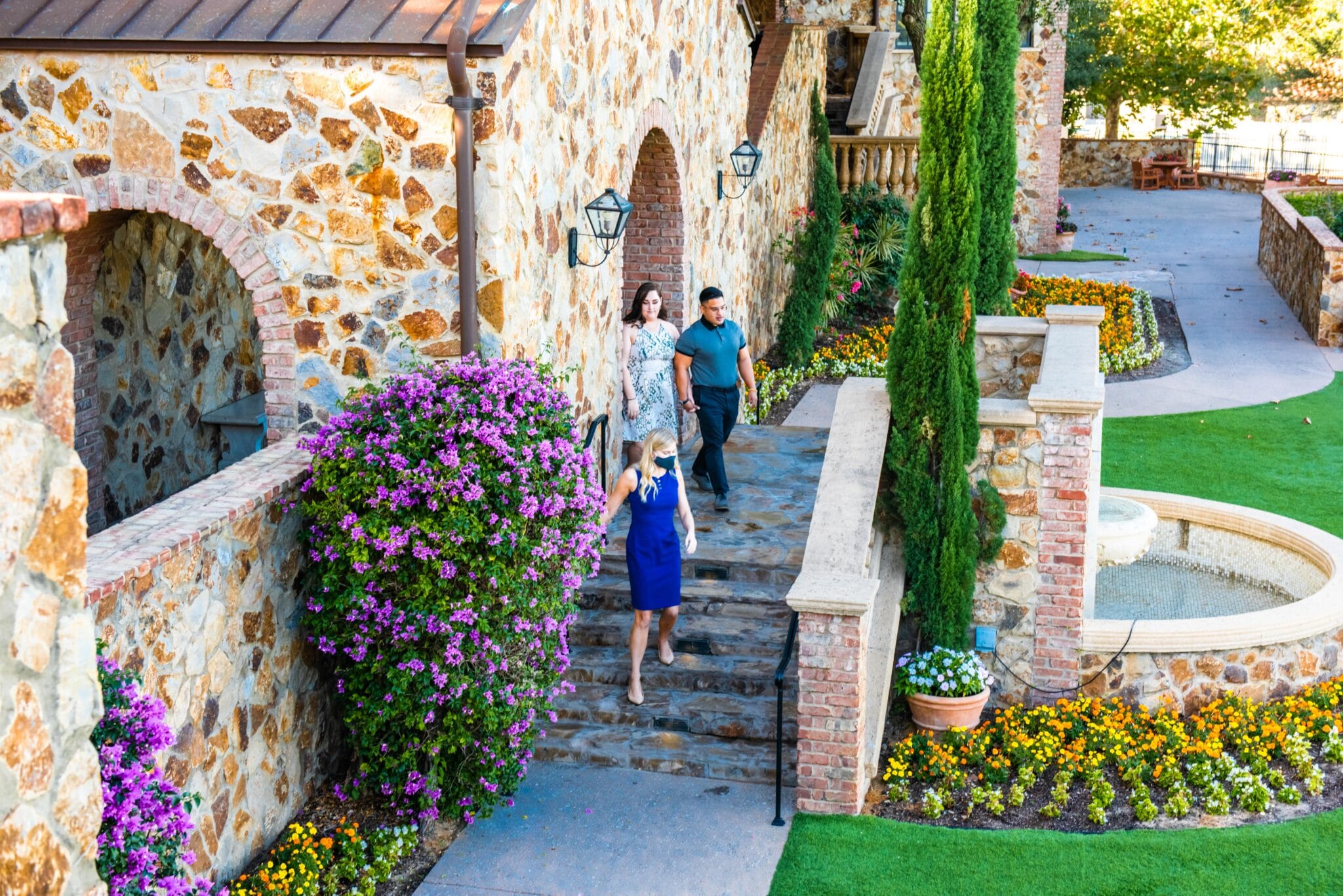 engaged couple walk through wedding venue looking for how to choose a wedding venue