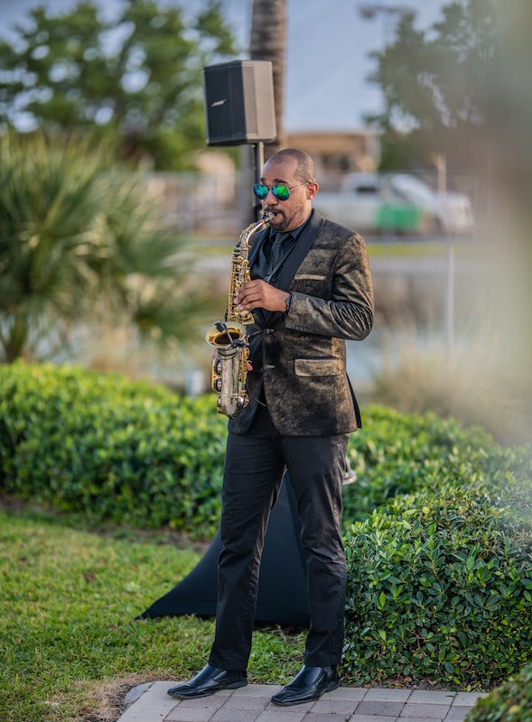 RLE3 Music saxophone player performing at an outdoor wedding