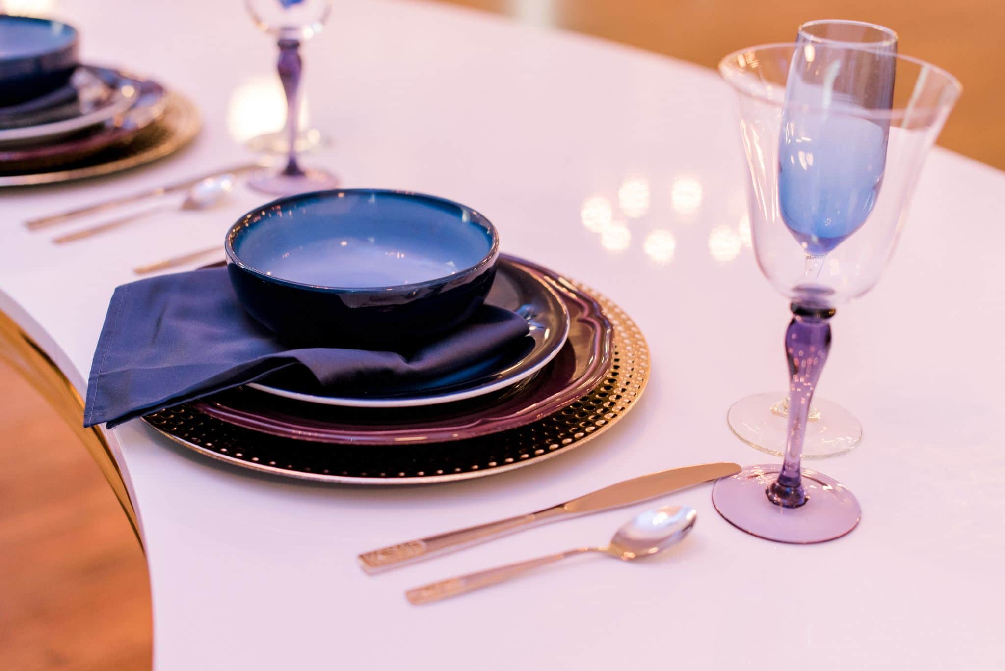 blue and purple tablewear set up for over the moon celestial theme styled wedding shoot