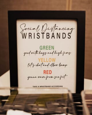 display sign for social distancing wristbands available in red yellow and green