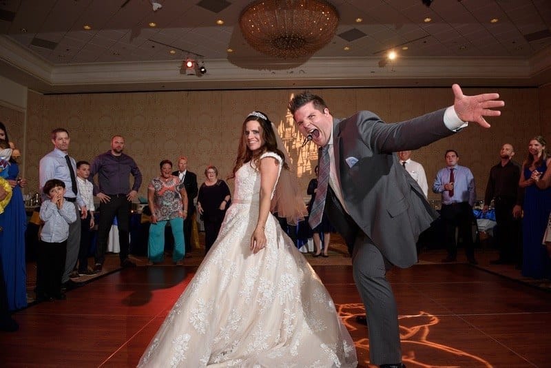 DJ JW posing with bride in middle of dance floor