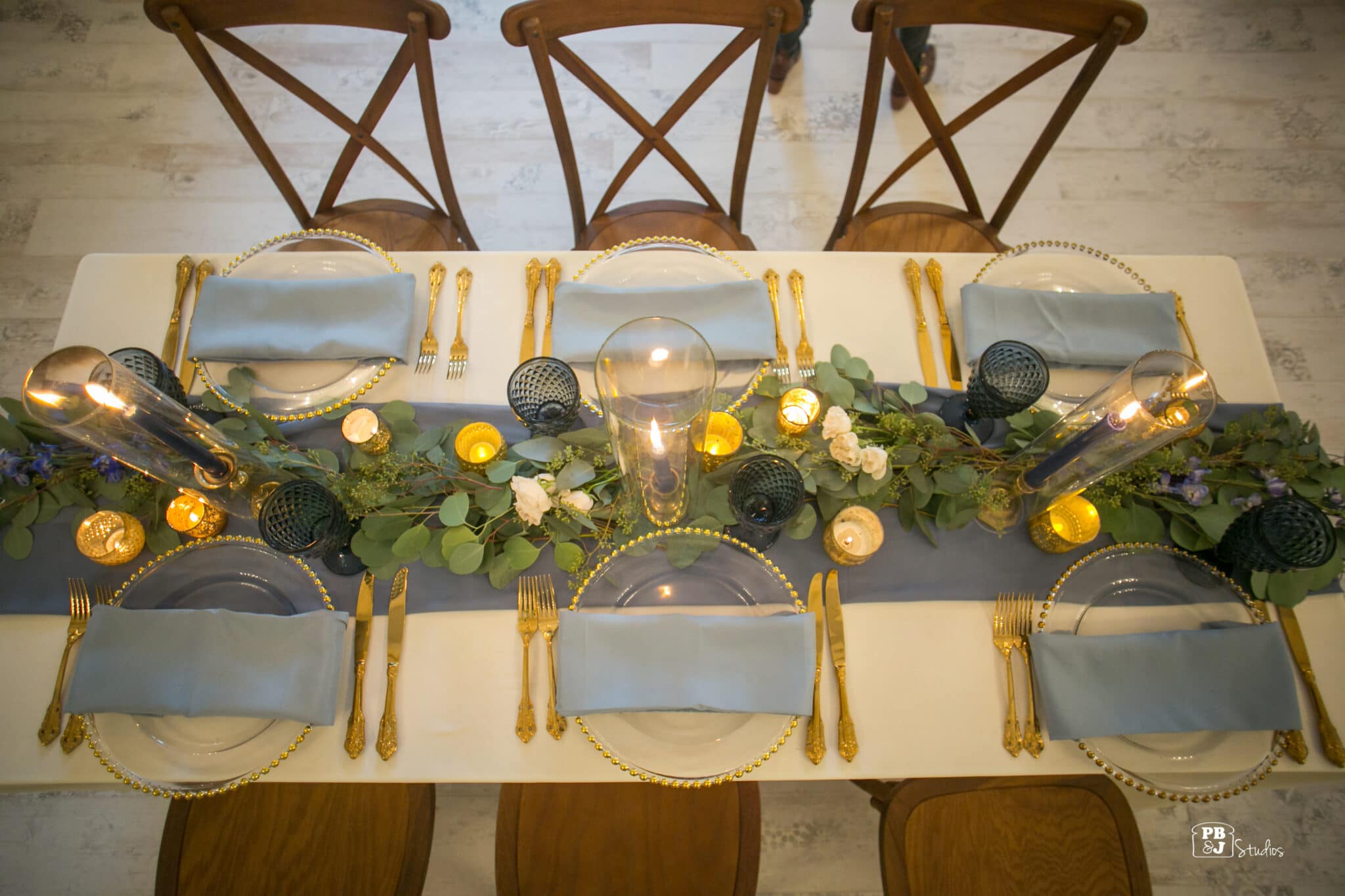 overhead view of table set with flowers & candles