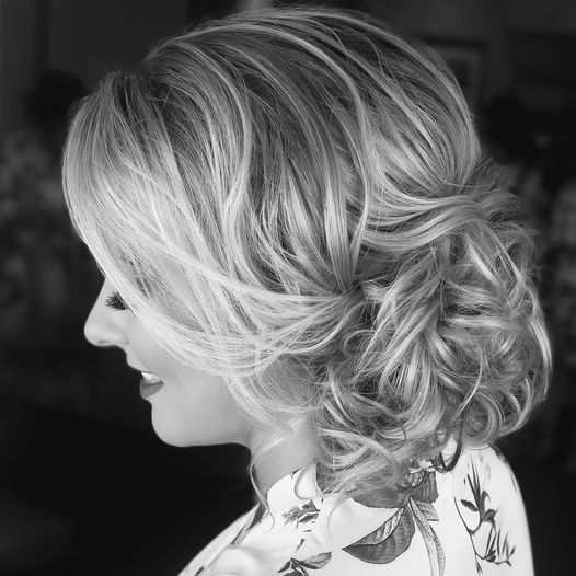 black and white photo of bride's hair done professionally for her wedding by Karmel Design Team