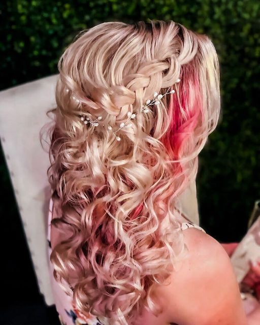 brides hair done by Karmel Design Team with pink highlights