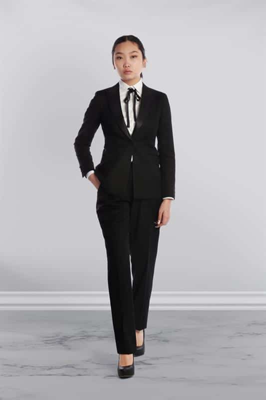 woman in an all black tux from Leonardo 5th Avenue with a white dress shirt