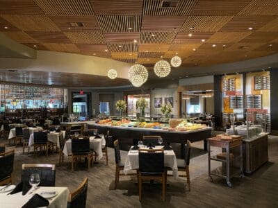 large room featuring buffet, indoor dining, and wine storage at Fogo de Chao