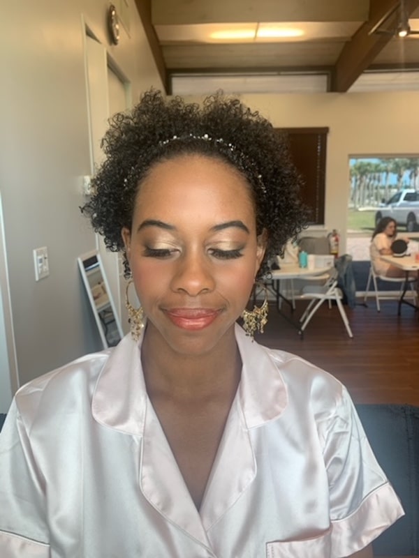 bride closing her eyes to show off the makeup provided by Marissa Renee Artistry